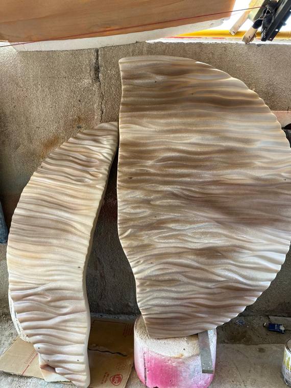 Sculpted wave panels